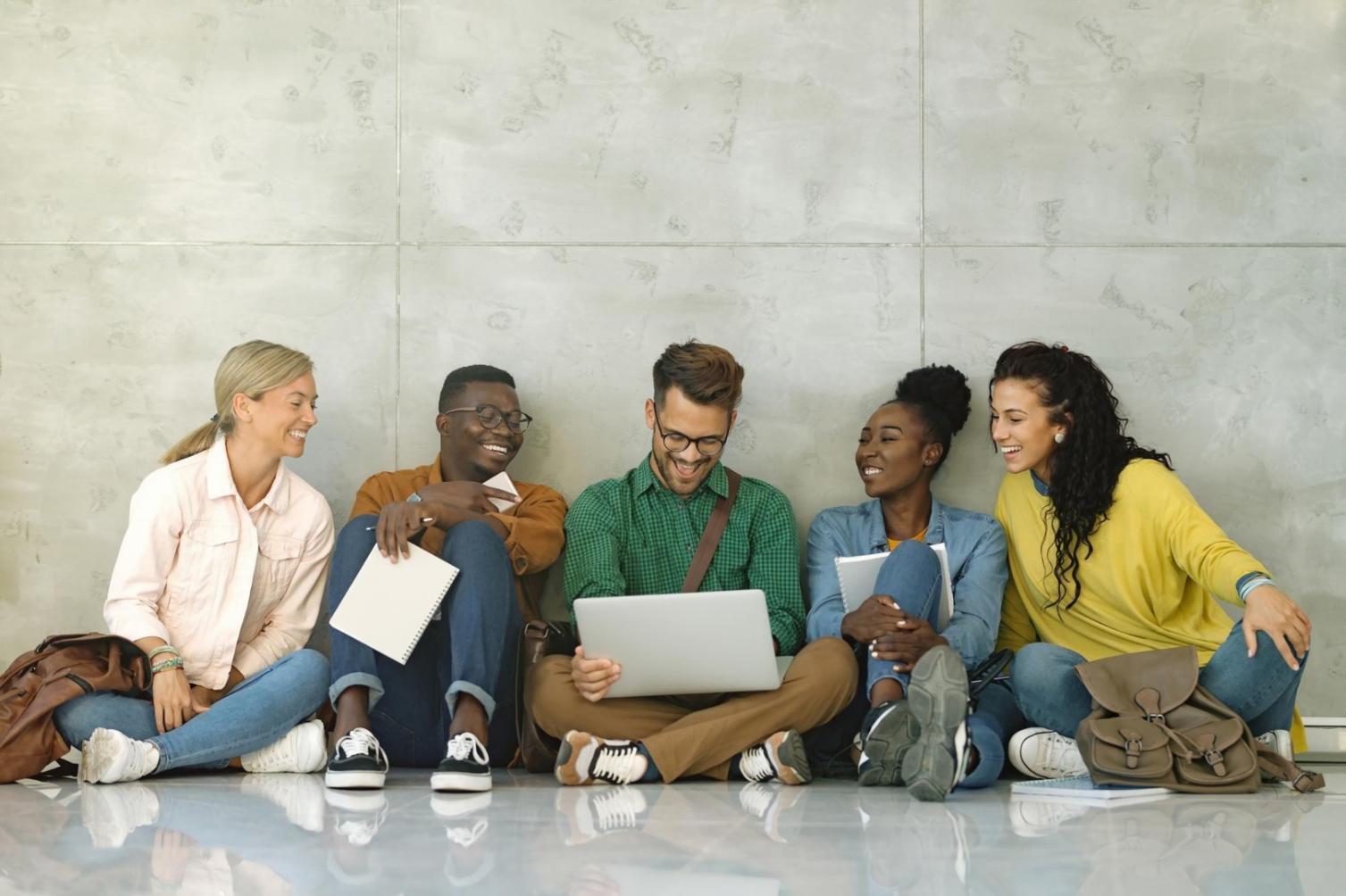 Student working on game localization project at computer workstation